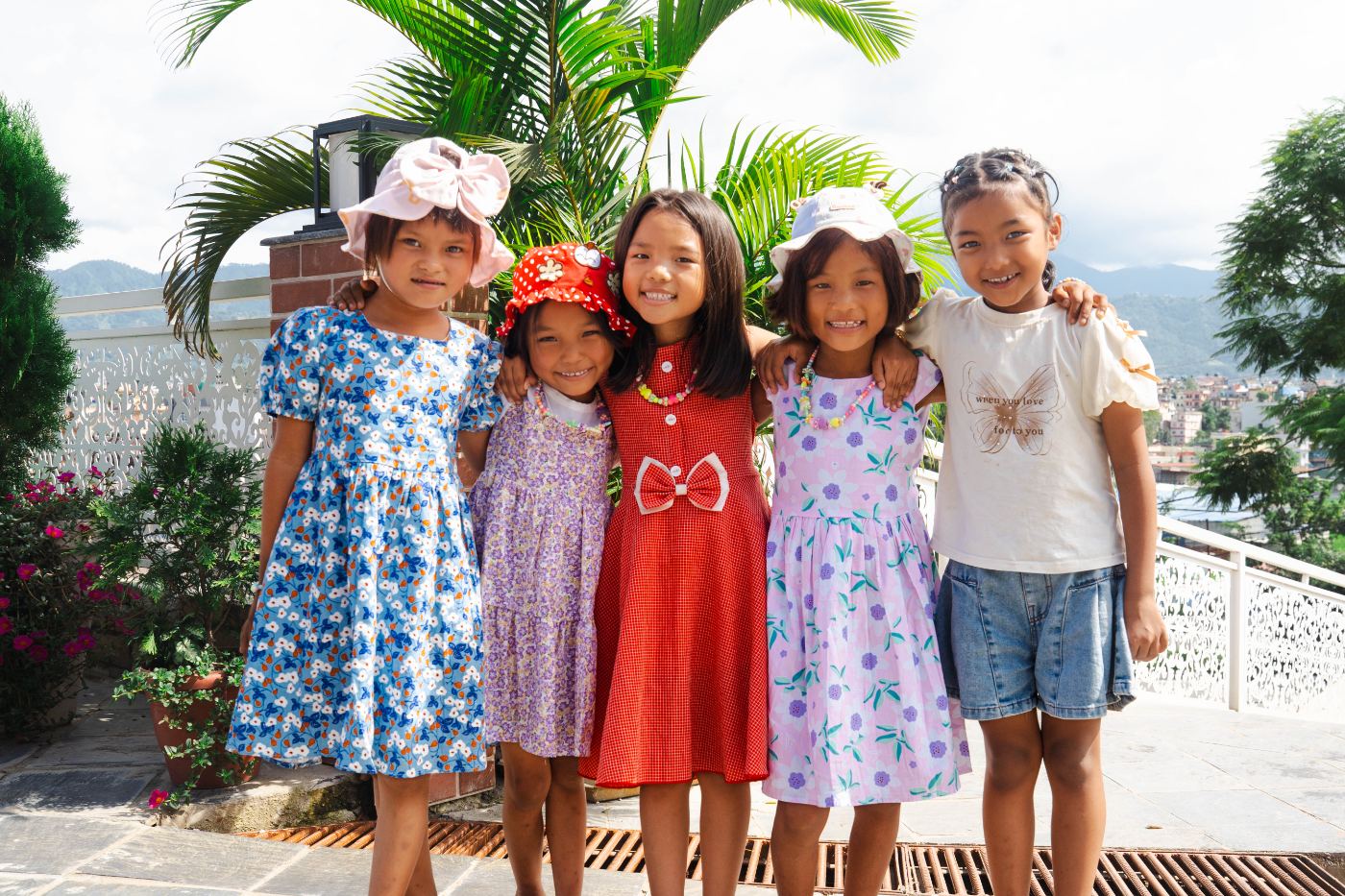 The four Chepang girls with an older Hearts for Nepal daughter at a celebration