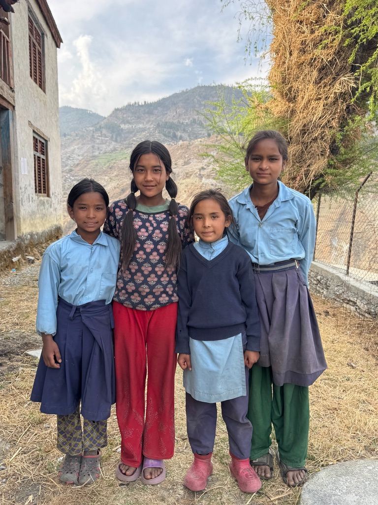 Girls from Mugu in their school uniforms, high in the mountains